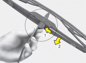 Hyundai Santa Fe: Blade replacement. 2. Compress the clip and slide the blade assembly downward.
