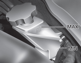 Hyundai Santa Fe: Checking the brake fluid level. Check the fluid level in the reservoir periodically. The fluid level should be