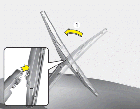 Hyundai Santa Fe: Blade replacement. 1. Raise the wiper arm and pull out the wiper blade assembly.