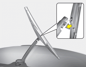 Hyundai Santa Fe: Blade replacement. 2. Install the new blade assembly by inserting the center part into the slot