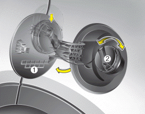 Hyundai Santa Fe: Opening the fuel filler lid. 1. Stop the engine.