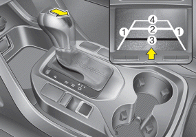 Hyundai Santa Fe: Rearview camera. The rearview camera will activate when the back-up light is ON with the ignition